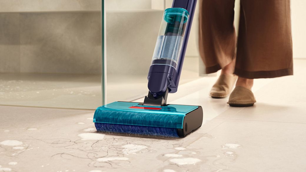 The Dyson Clean+Wash Hygiene hard floor cleaner cleaning wet spills from the floor.