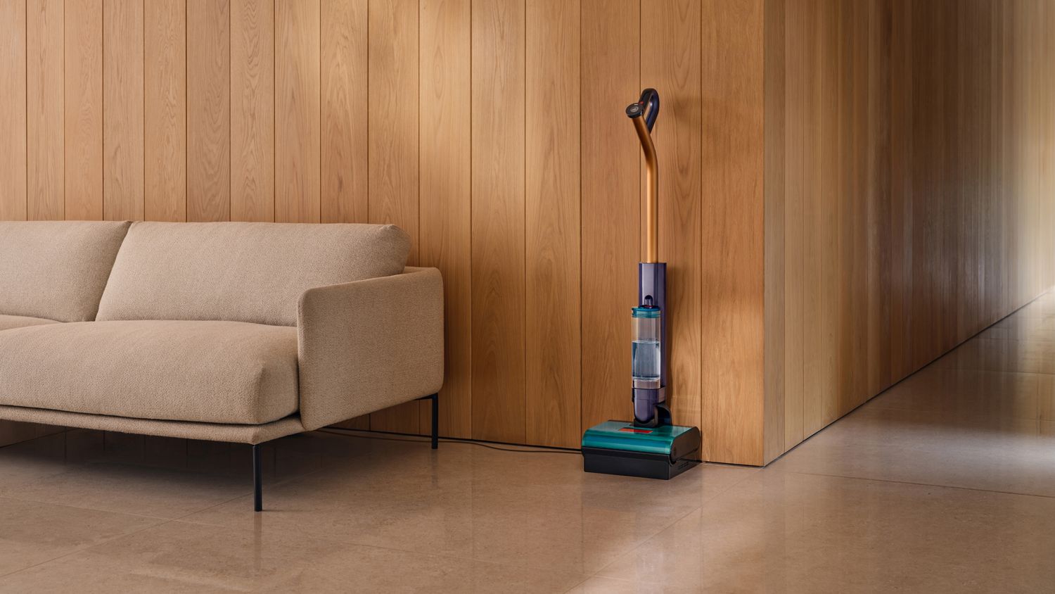 The Dyson Clean+Wash Hygiene hard floor cleaner with a floor it has cleaned.