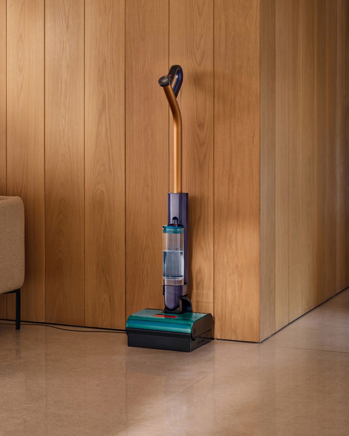 The Dyson Clean+Wash Hygiene hard floor cleaner with a floor it has cleaned.