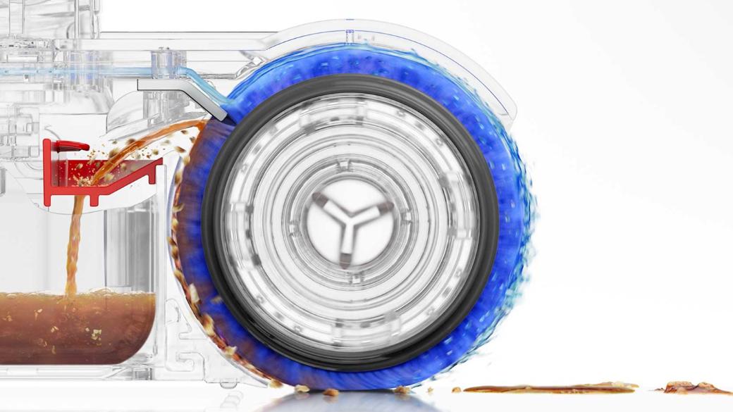 Az ábra bemutatja, hogyan mossa le a Dyson PencilWash a nedves görgőt tiszta vízzel minden fordulatnál.