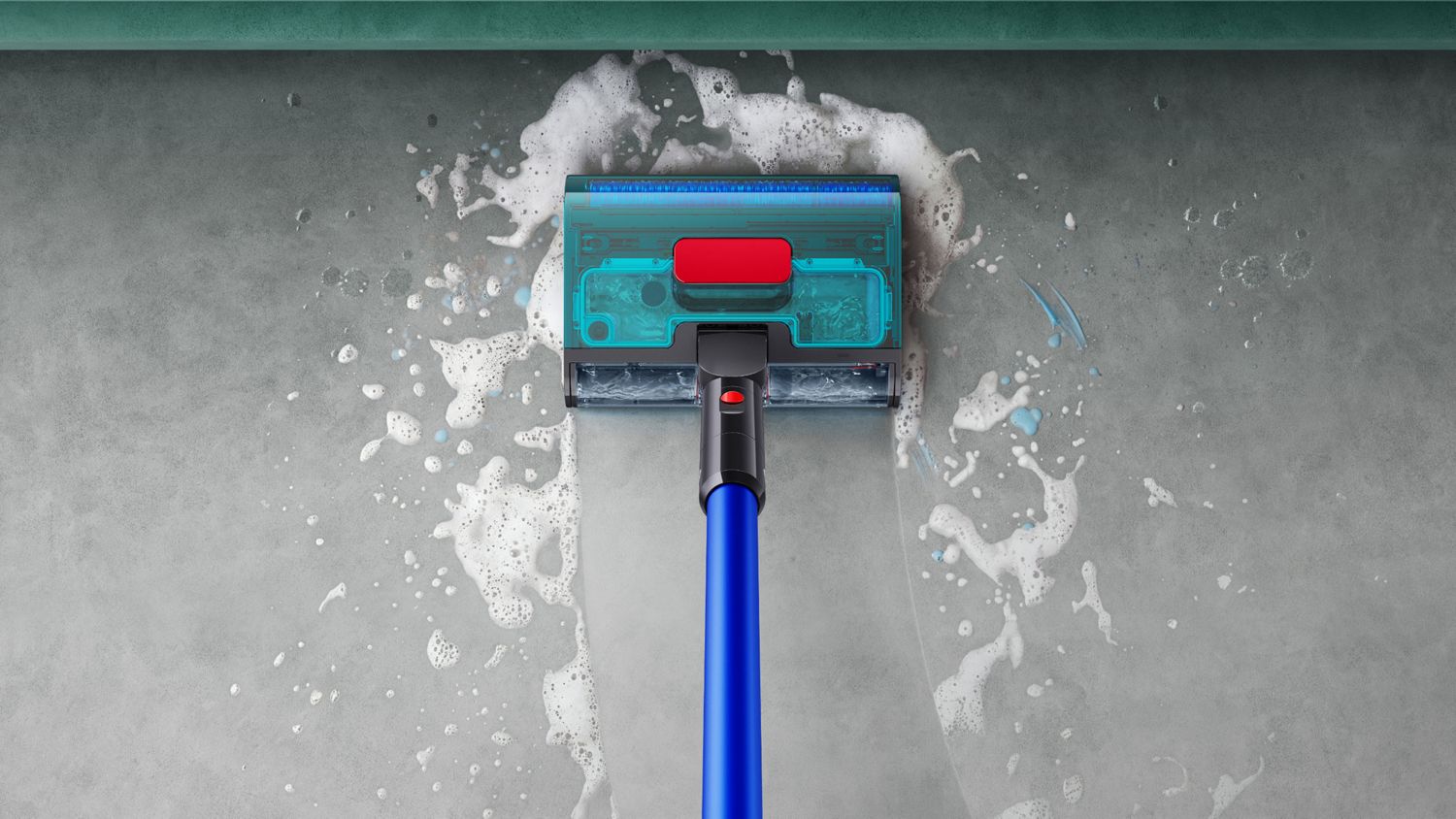 Dyson W1 PencilWash cleaner cleaning to the edge on a hard floor.