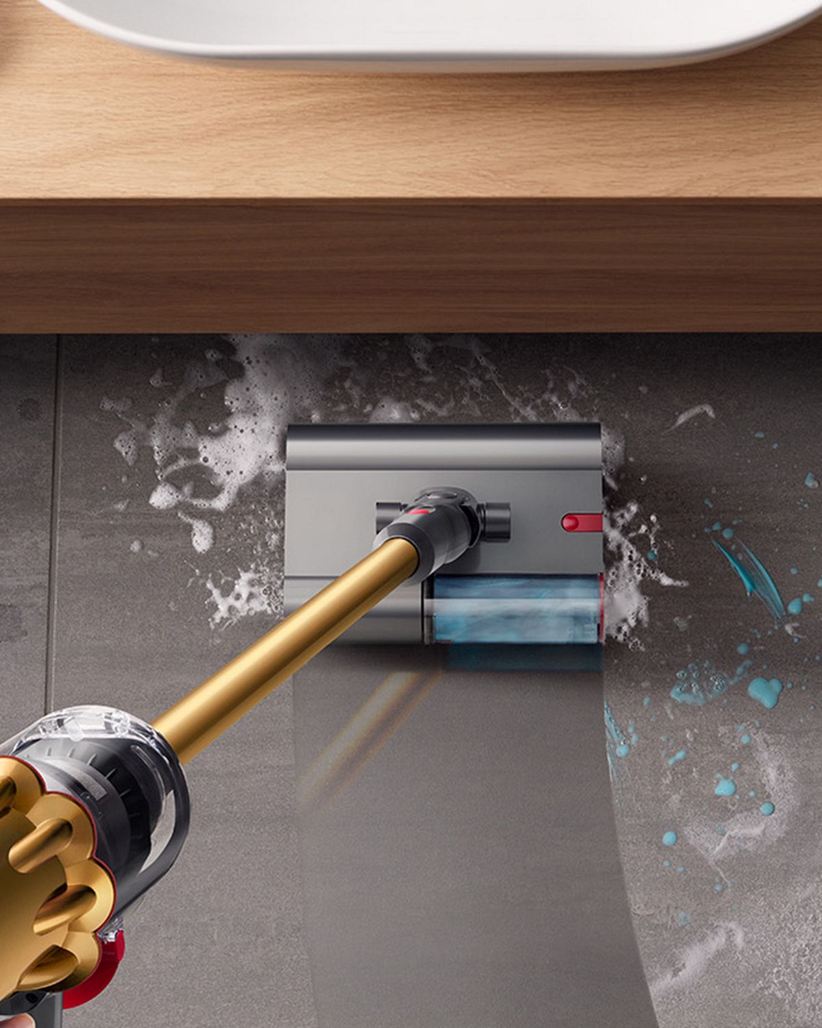 The Dyson V12s Detect Slim Submarine cleans the floor of a bathroom.