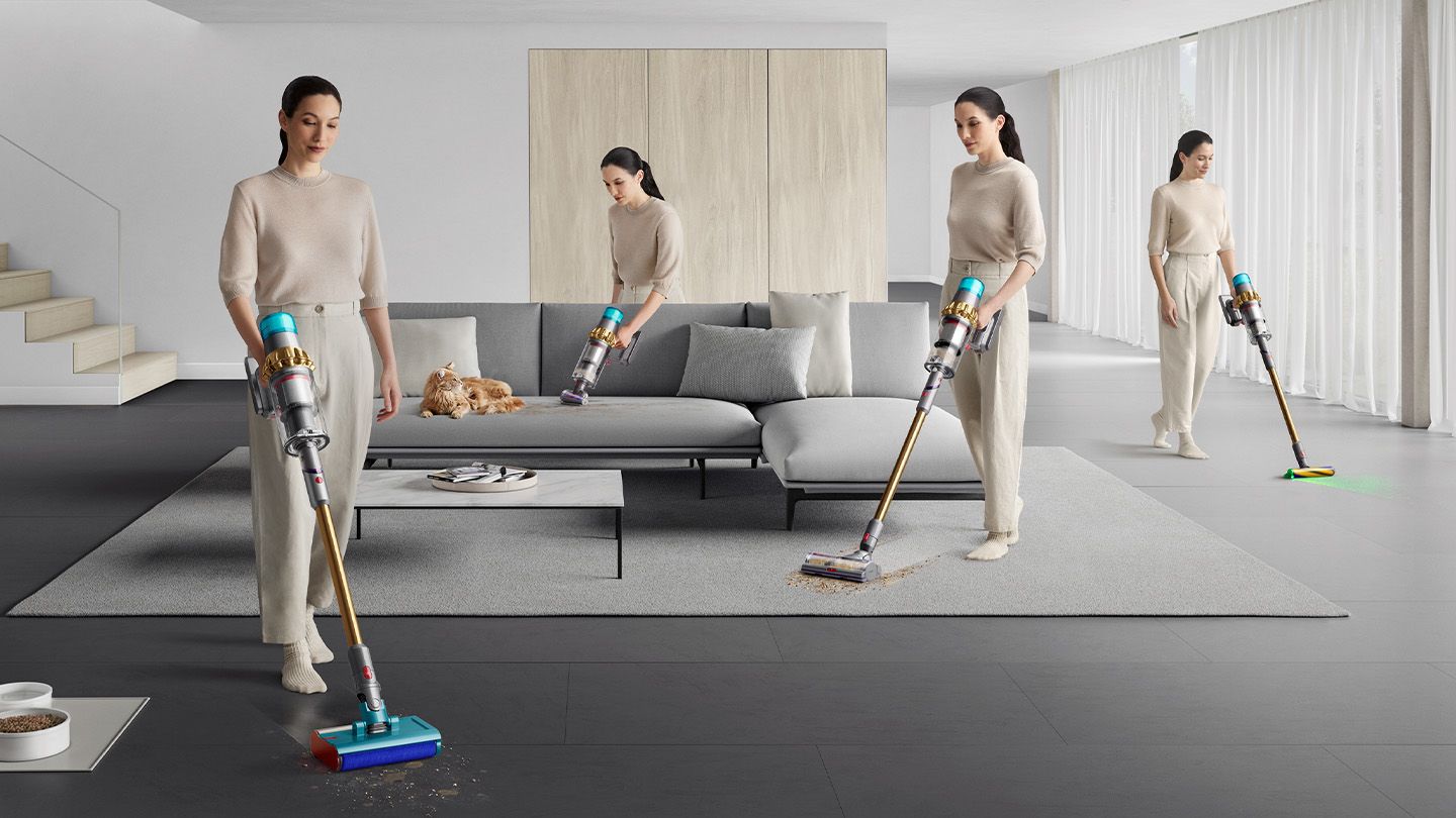 A woman uses the Dyson V15s Submarine wet + dry vacuum cleaner to clean in different scenarios. 