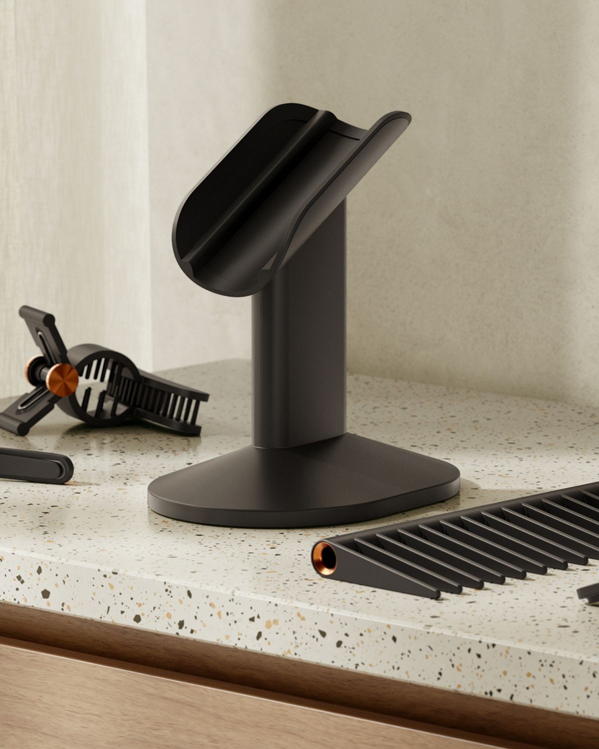 Close-up of the overmoulding on the Dyson-designed display stand for corded devices.