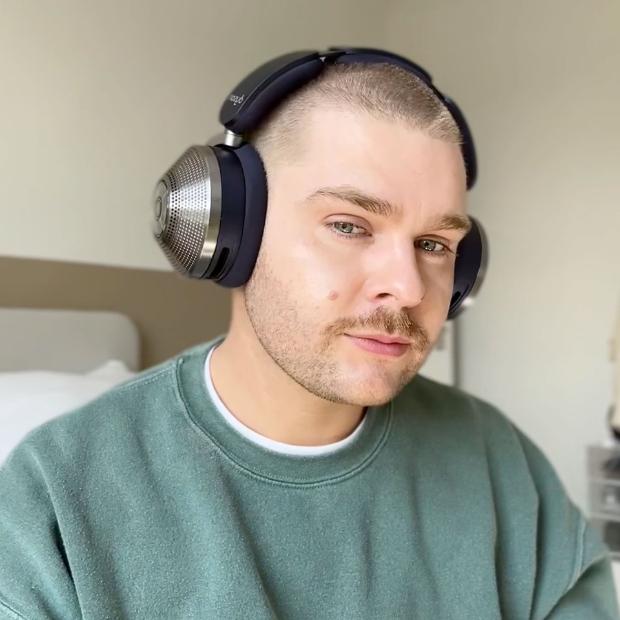 Man wearing Dyson Zone noise-cancelling headphones