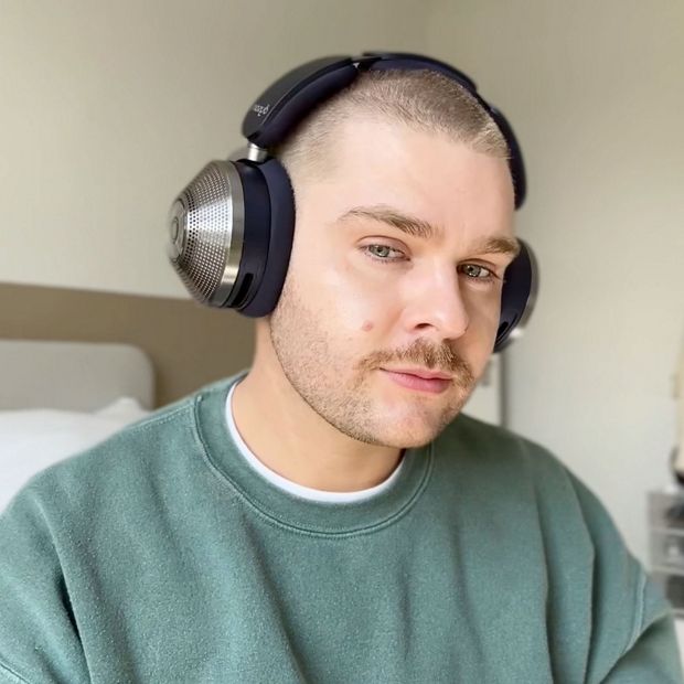 Man wearing Dyson Zone noise-cancelling headphones