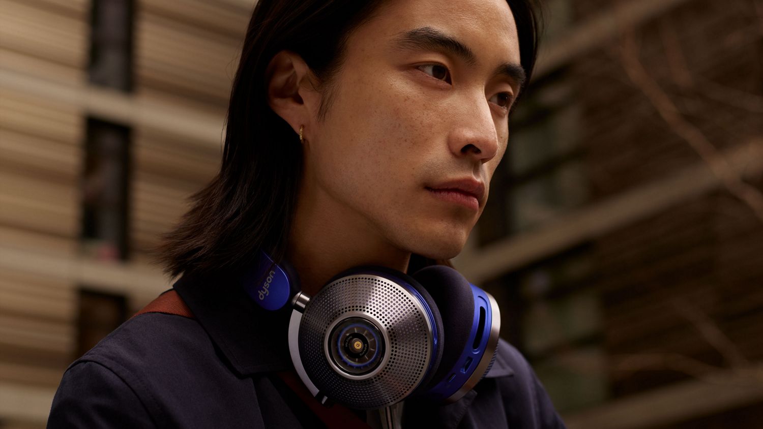 Person wearing Dyson Zone headphones