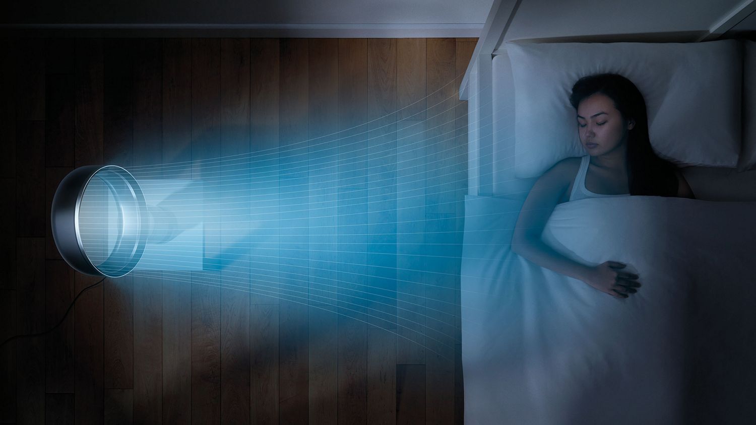 Un Dyson Cool placé sur le sol avec un enfant assis à côté.