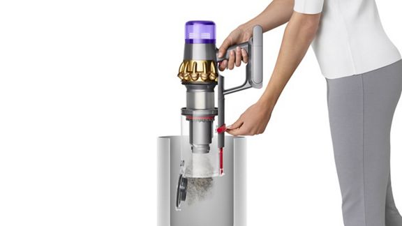 Contenitore dell'aspirapolvere senza filo Dyson V11 Absolute Extra + che viene svuotato