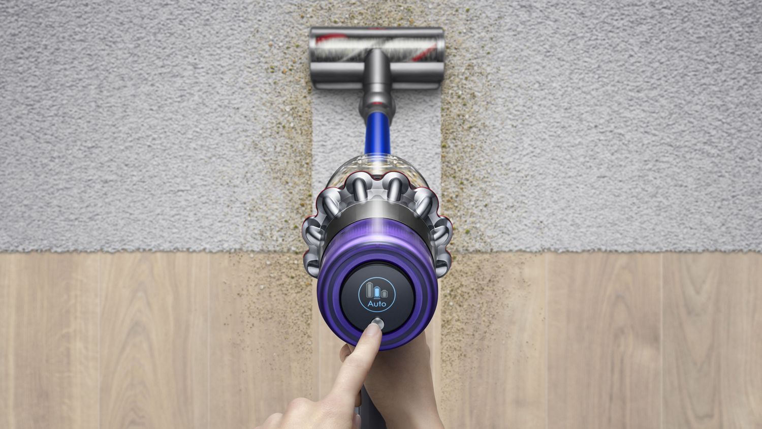 Aspirapolvere senza filo Dyson V11 Absolute Extra che raccoglie lo sporco da pavimento e tappeto