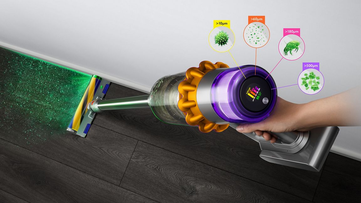 Dyson V12 Detect Slim vacuum with Slim Fluffy Laser cleaner head, showing sizes of dust detected