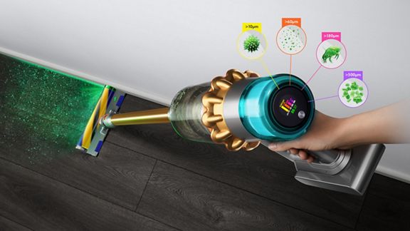 Dyson V15 Detect Slim vacuum with Slim Fluffy Laser cleaner head, showing sizes of dust detected