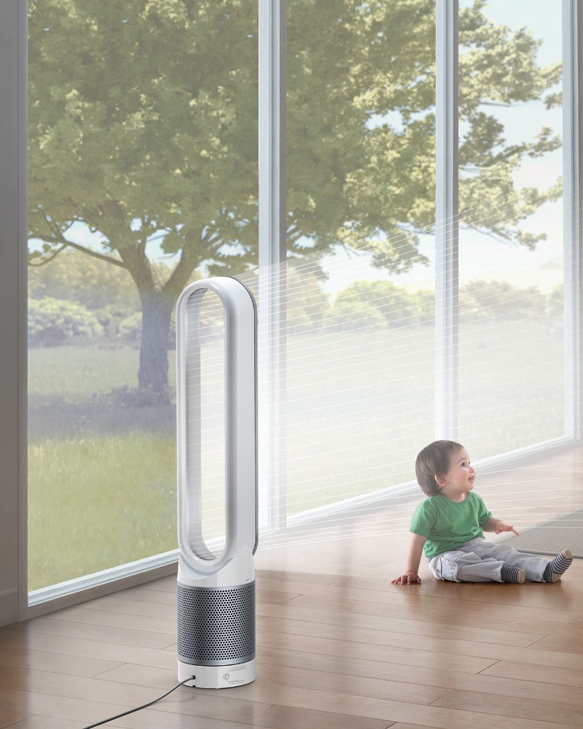 A woman and a child in a living room with a Dyson Pure Cool purifier fan. 