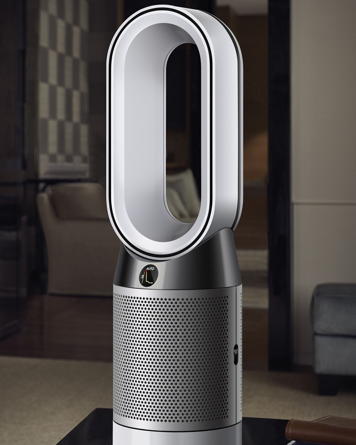 A Dyson Hot + Cool purifier sits on a table.