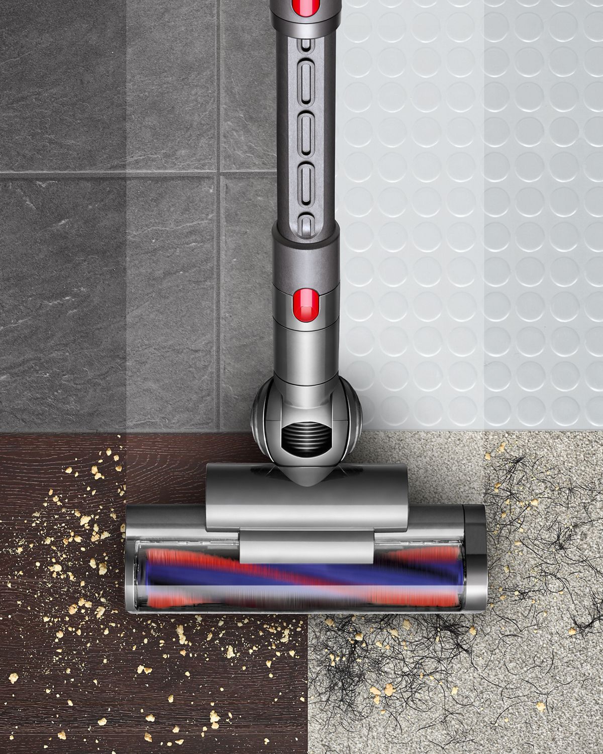 Dyson Big ball canister vacuum cleaner's turbine brush bar picking up debris from carpet.