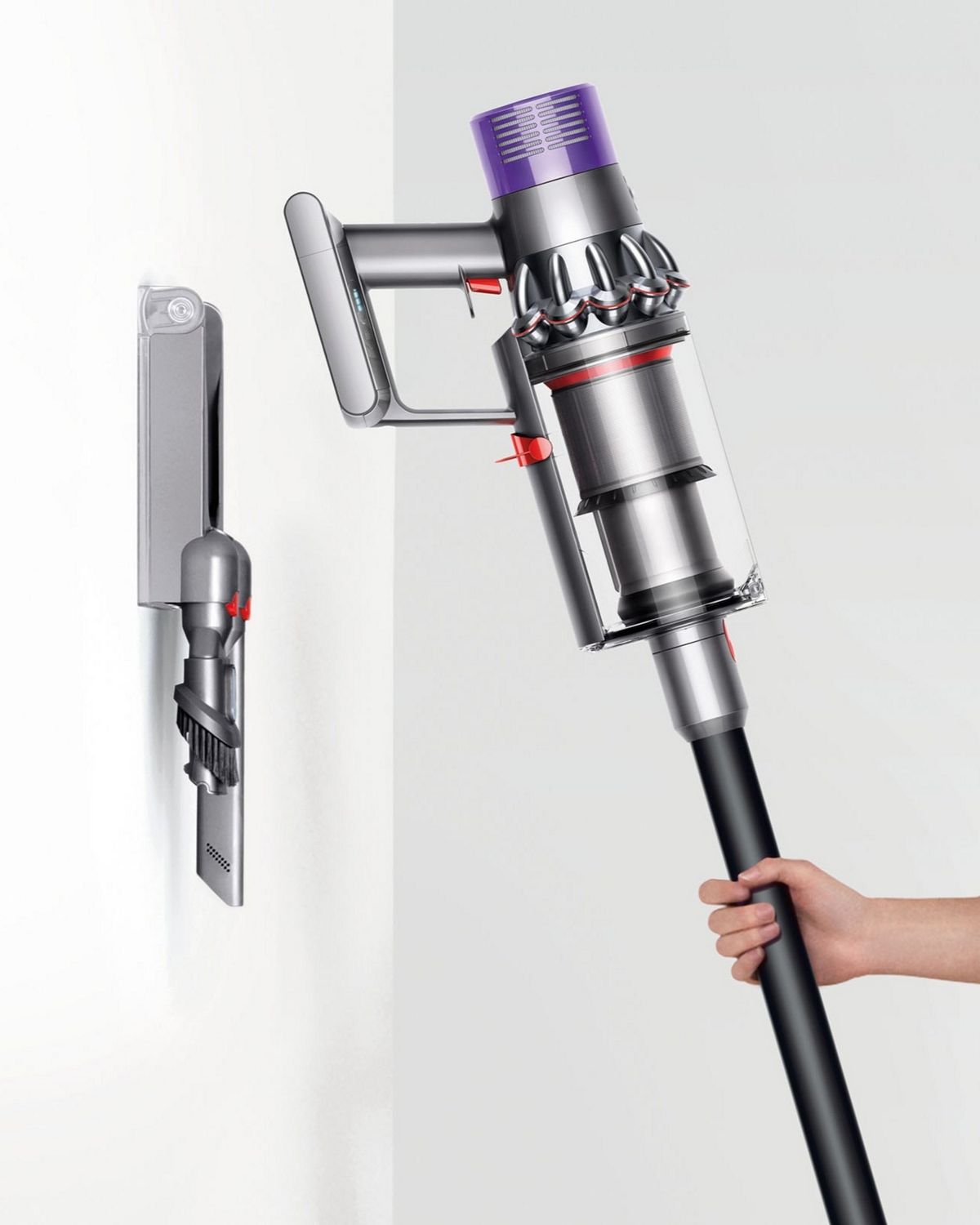 Dyson V10 Animal cordless vacuum being placed into charging dock.