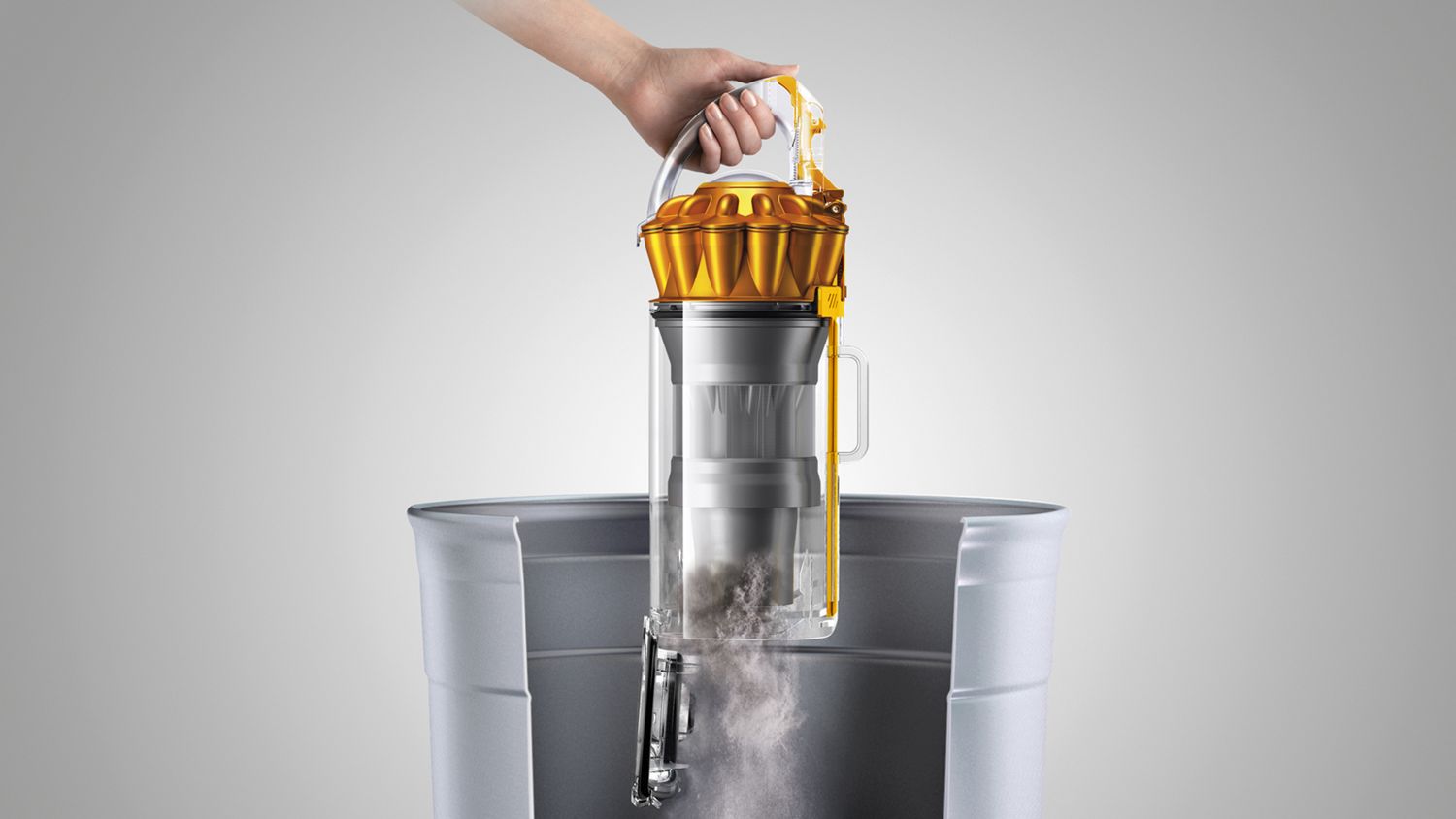 Dyson Ball Multifloor 2 upright vacuum cleaner cleaning carpet and hard floor side by side each other.