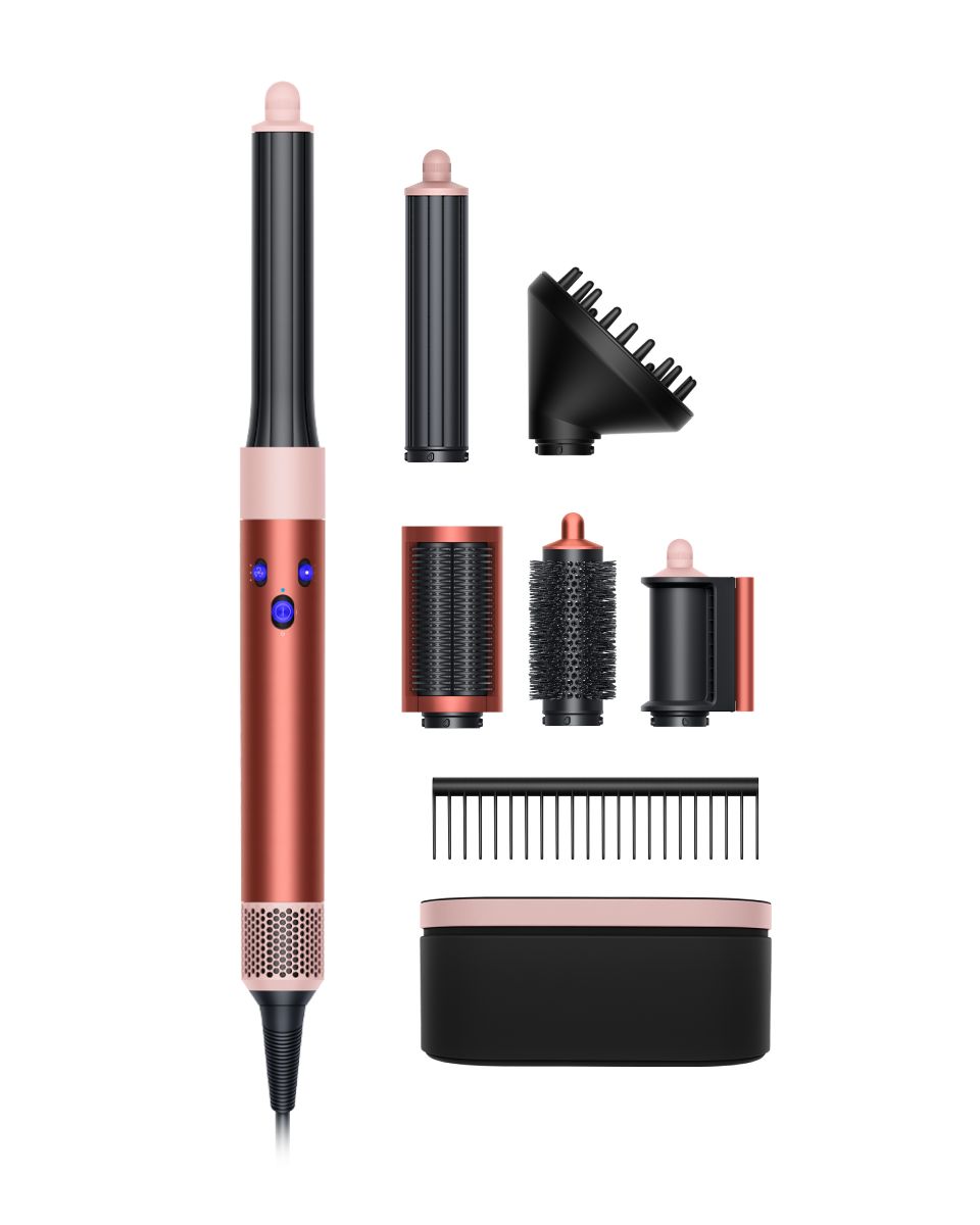 The Dyson Airwrap multi-styler and dryer beside its attachments and presentation case