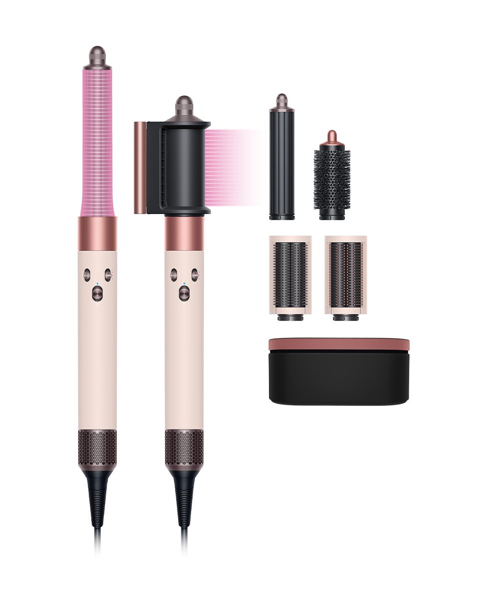 Full-length view of the Dyson Airwrap multi-styler and dryer finished in Ceramic pink and rose gold.