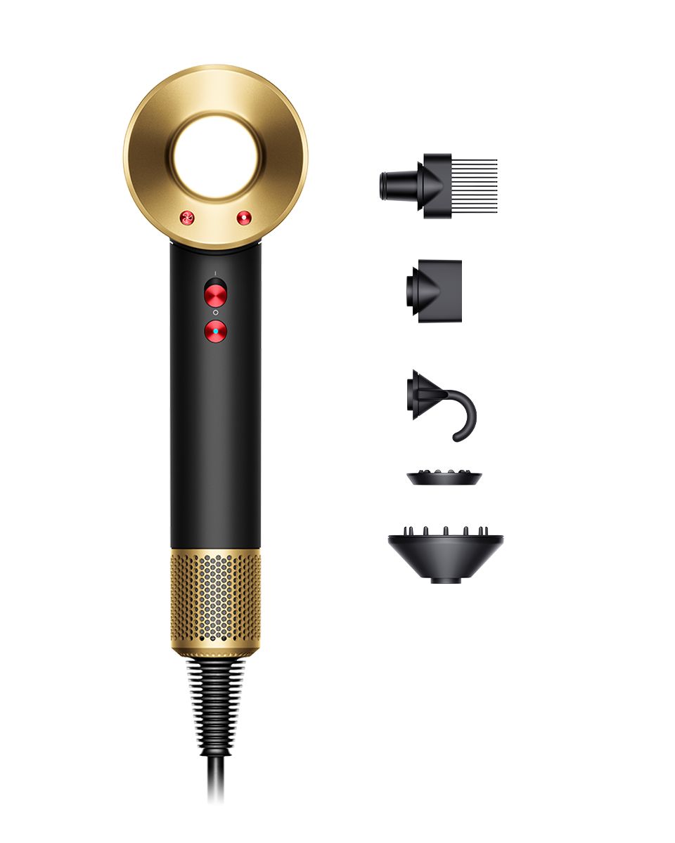 Dyson Supersonic hair dryer Oynx and gold with attachments and Presentation case.