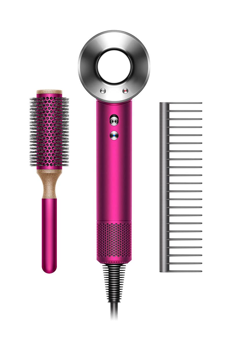Dyson Supersonic™ hair dryer gift edition featuring the Dyson Supersonic™ hair dryer in fuchsia and nickel. Dyson Supersonic™ hair dryer gift edition featuring the Dyson Supersonic™ hair dryer in fuchsia and nickel.