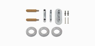 Supporto a parete con alloggiamenti per accessori magnetici