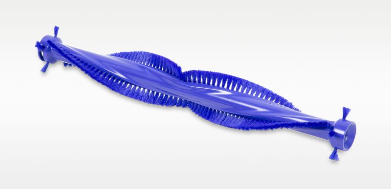 Rear debris brush bar