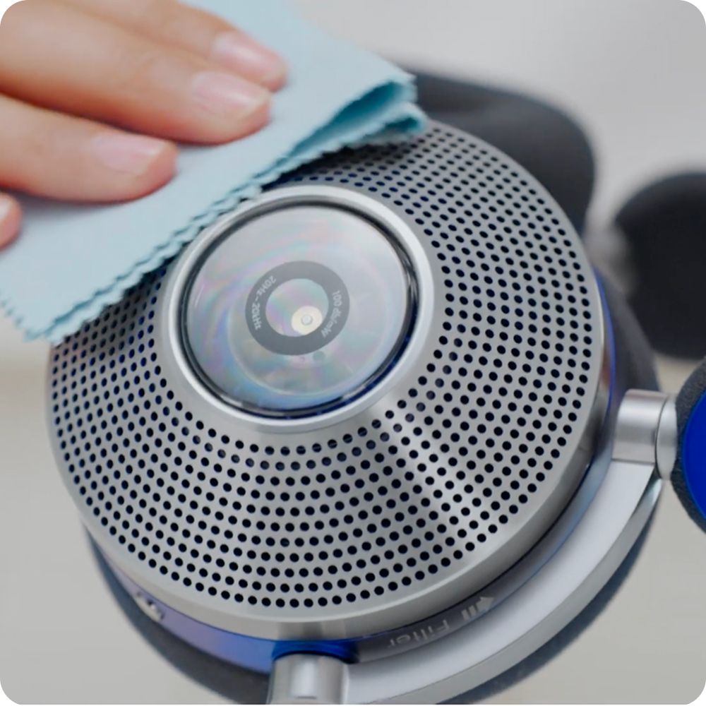 Dyson Zone headphones wiped with a cloth.