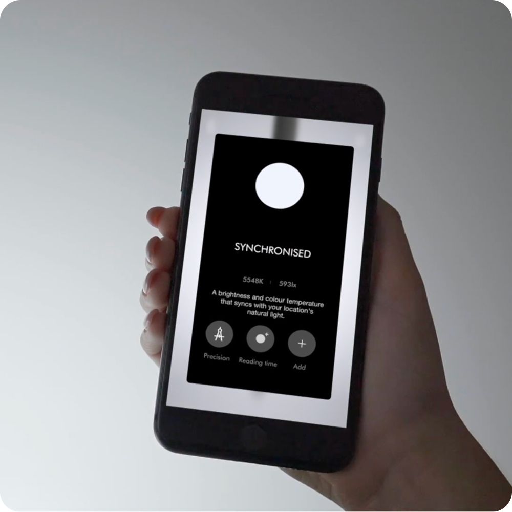 Dyson Lightcycle Morph light customised using a mobile phone.