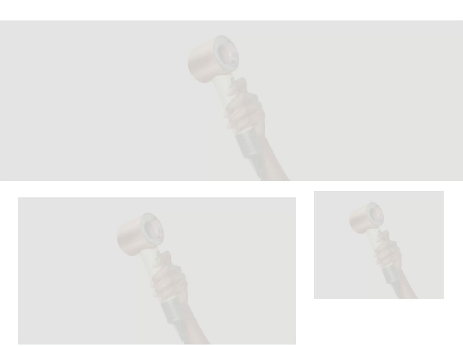 A Dyson Supersonic Travel hair dryer held in a hand.