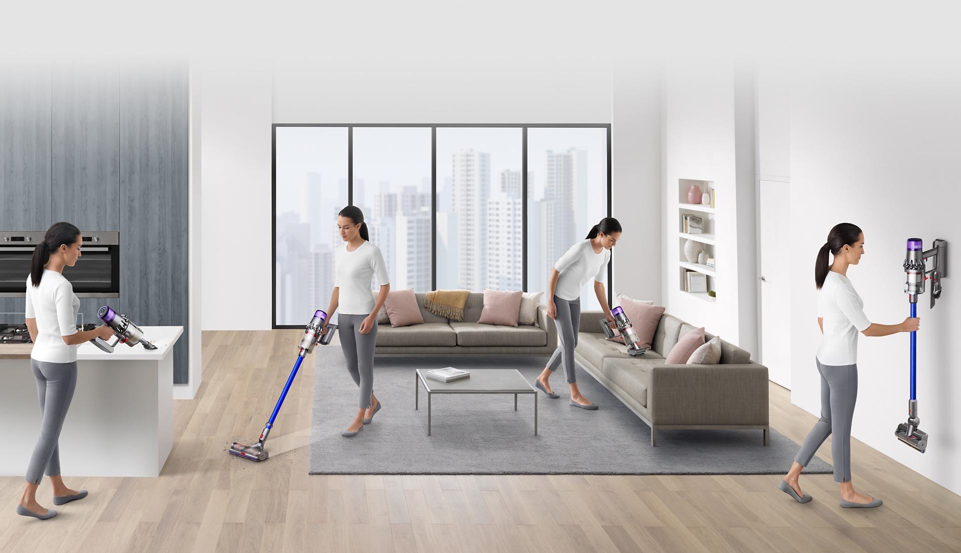 Woman cleaning around house using a Dyson V11