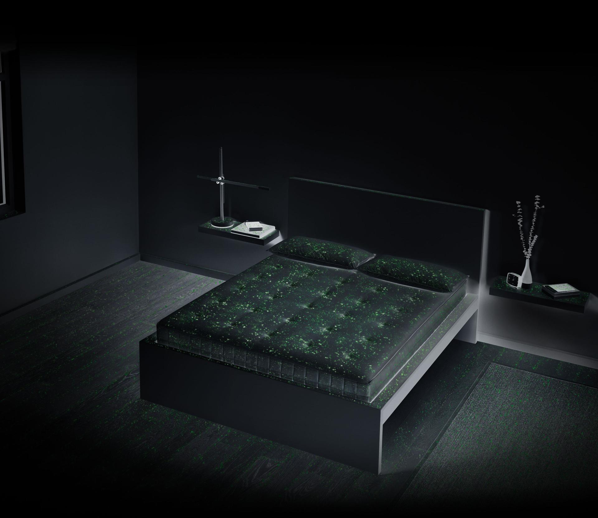 Bed under UV lighting showing bacteria that is found on the mattress