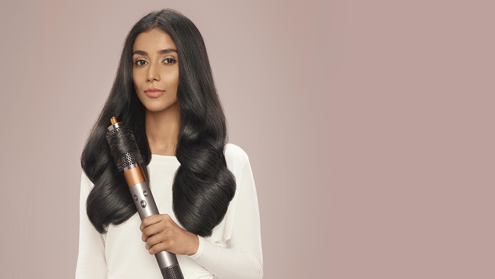 Model wearing Voluminous Blow Dry style