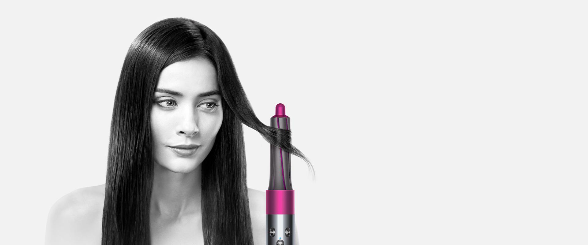 Model demonstrating the Dyson Airwrap™ hair styler on straight hair