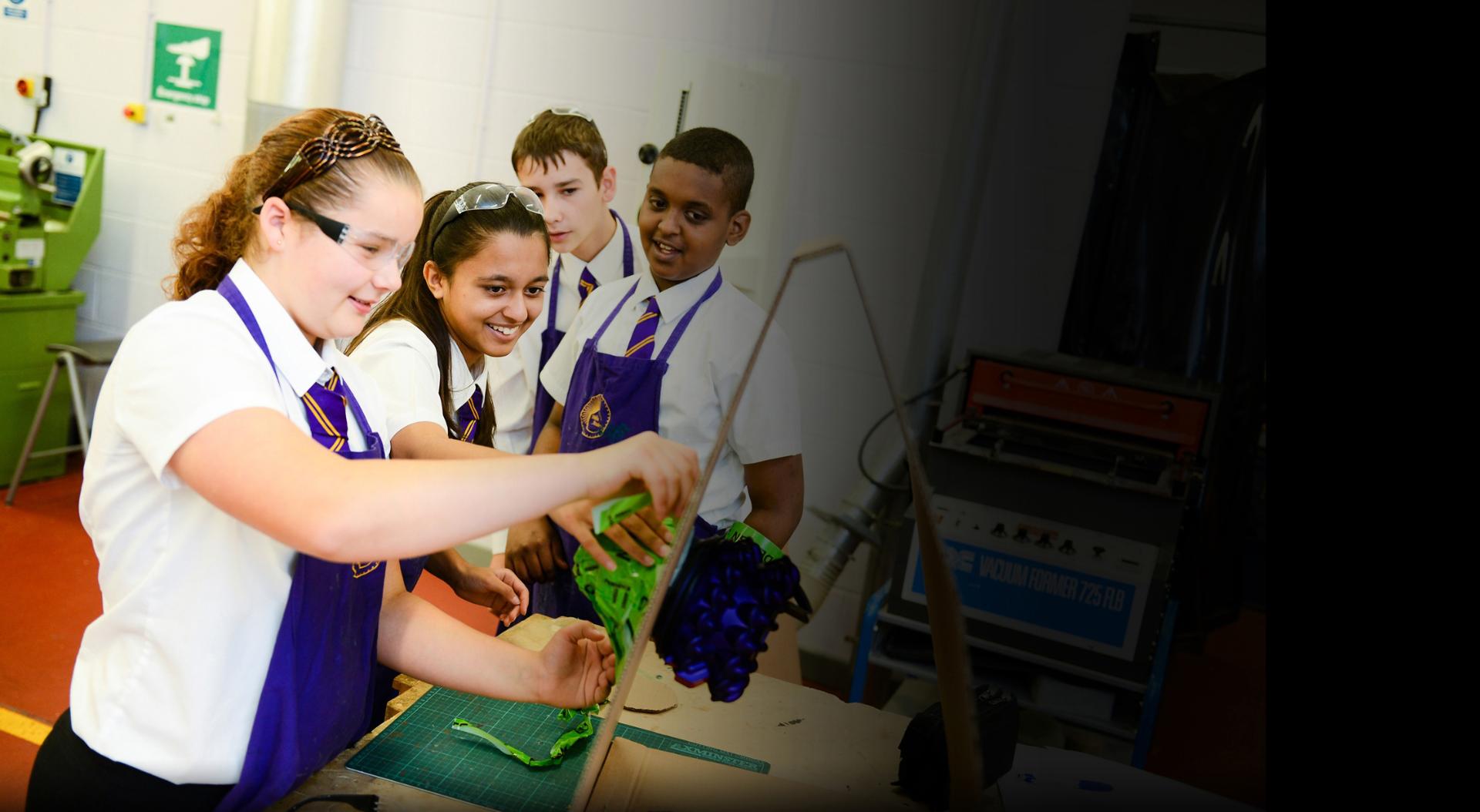 Young engineering students solving problems