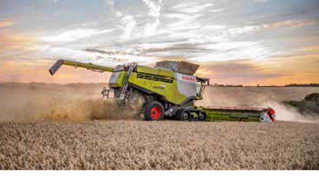 Combine harvestor in a field