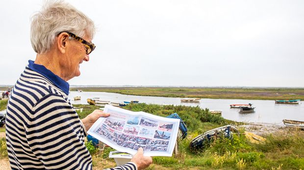 James Dyson holding a copy of the 1957 Eagle a