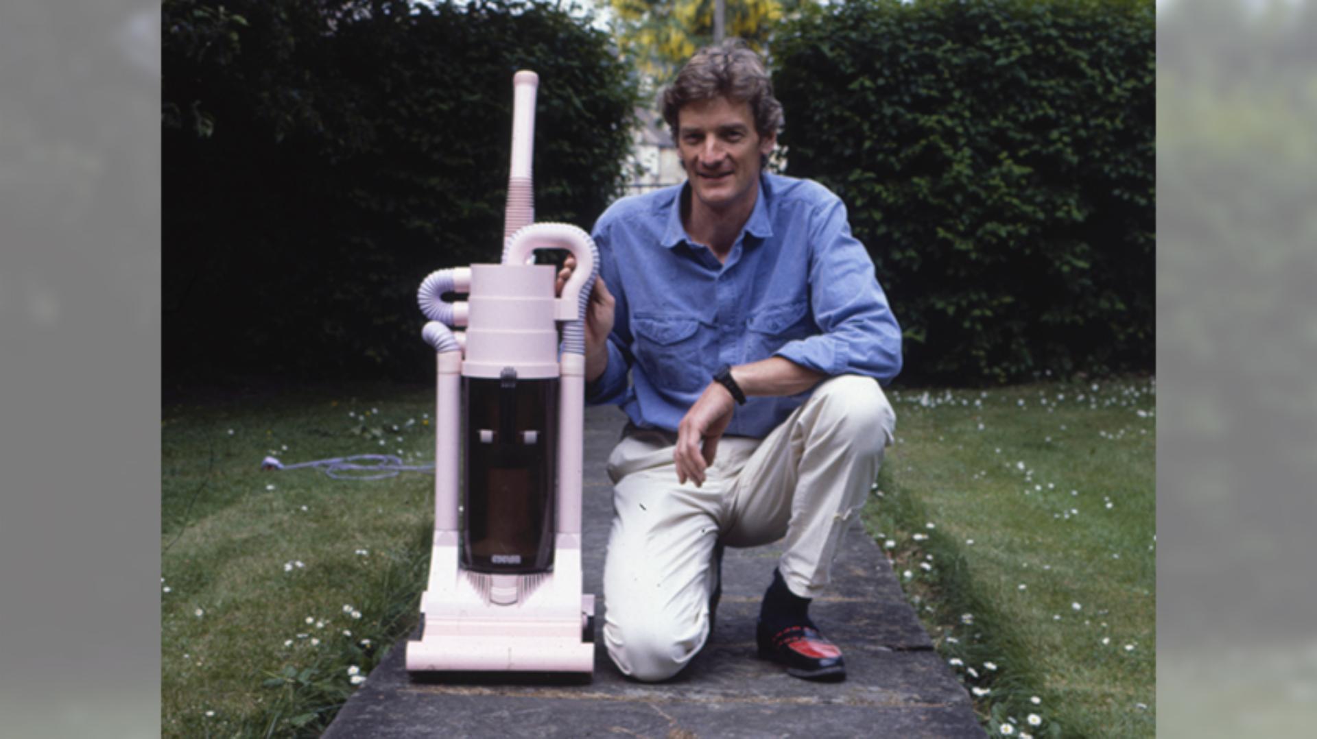 James Dyson crouching next to a G-Force