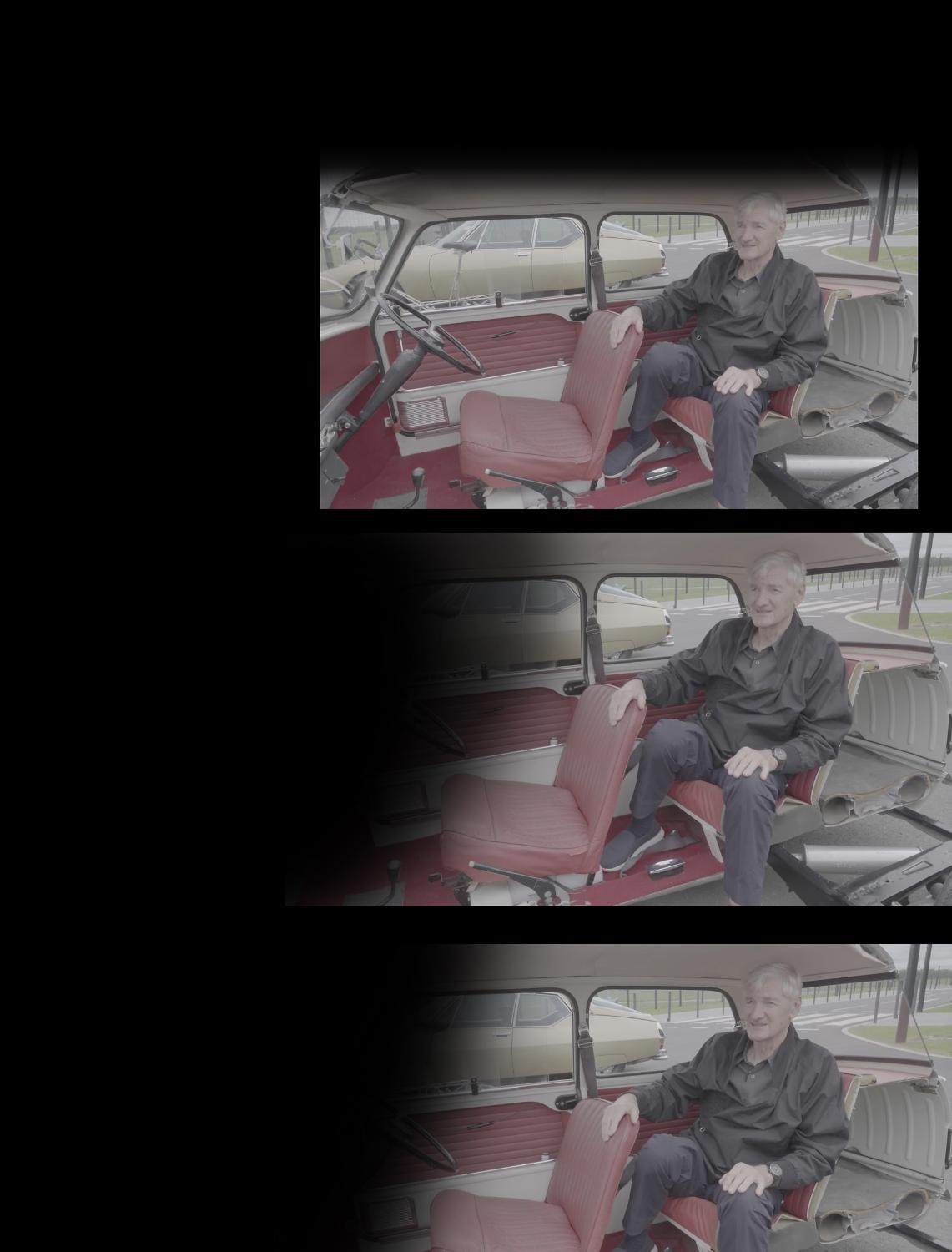 James Dyson sat in the back seat of an old car