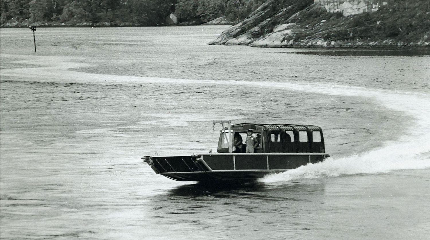 The Sea Truck high-speed landing craft turning at speed on water.