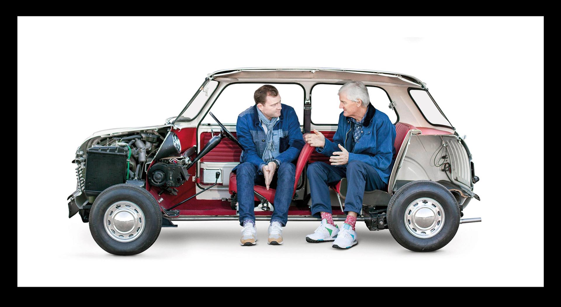 Jake and James in deep conversation while seated within a classic mini.