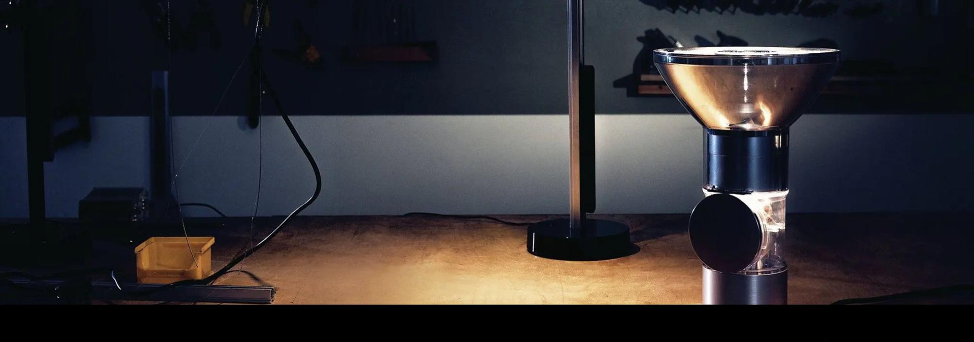 A variety of Jake Dyson lamps in a tooling workshop environment.