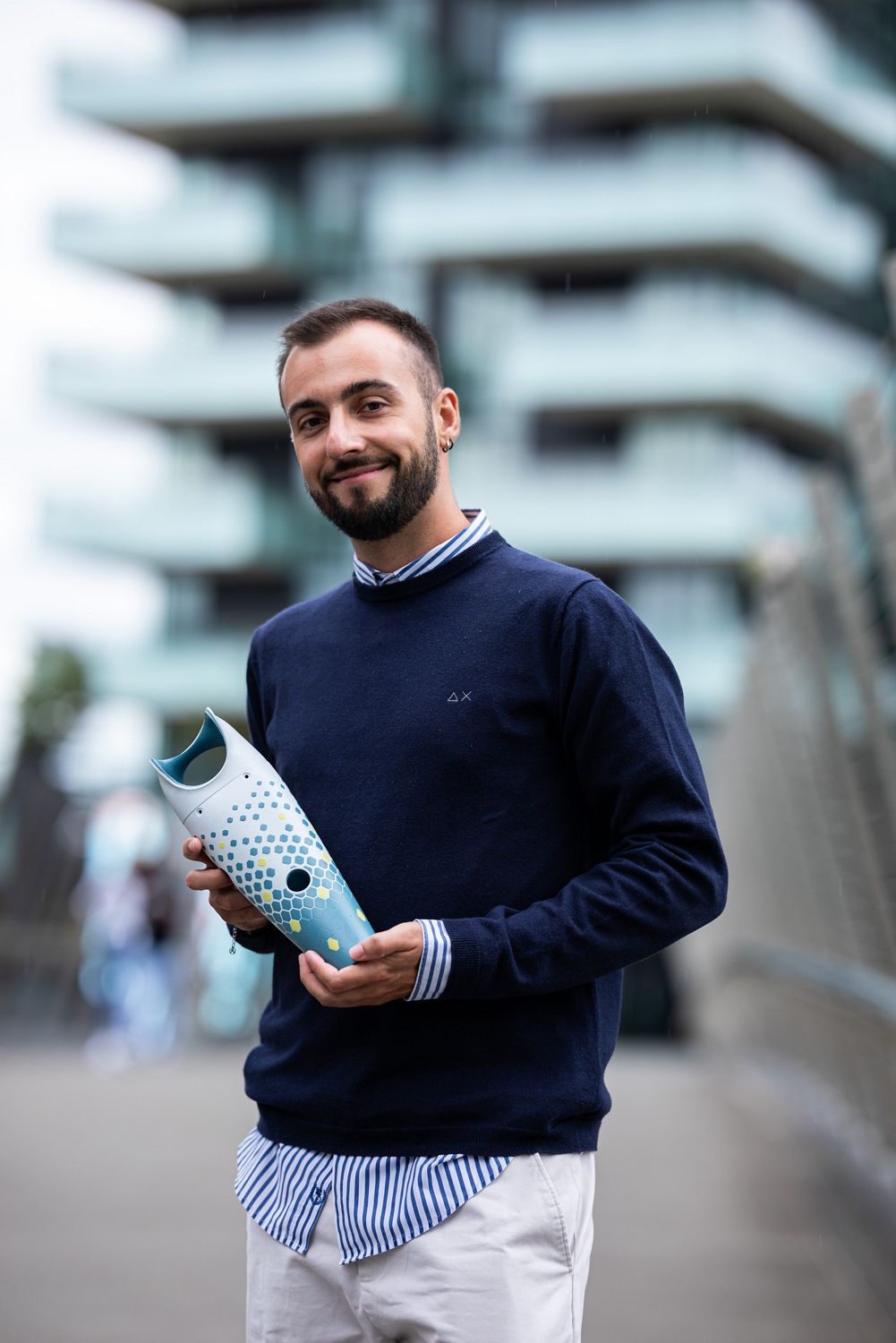 Joseph Bentley holds the REACT device