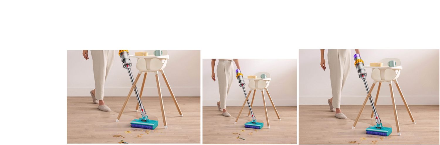 Dyson V15s Detect Submarine wet roller head angled in between a high chairs legs clearing spilt food and drink off a laminate floor.