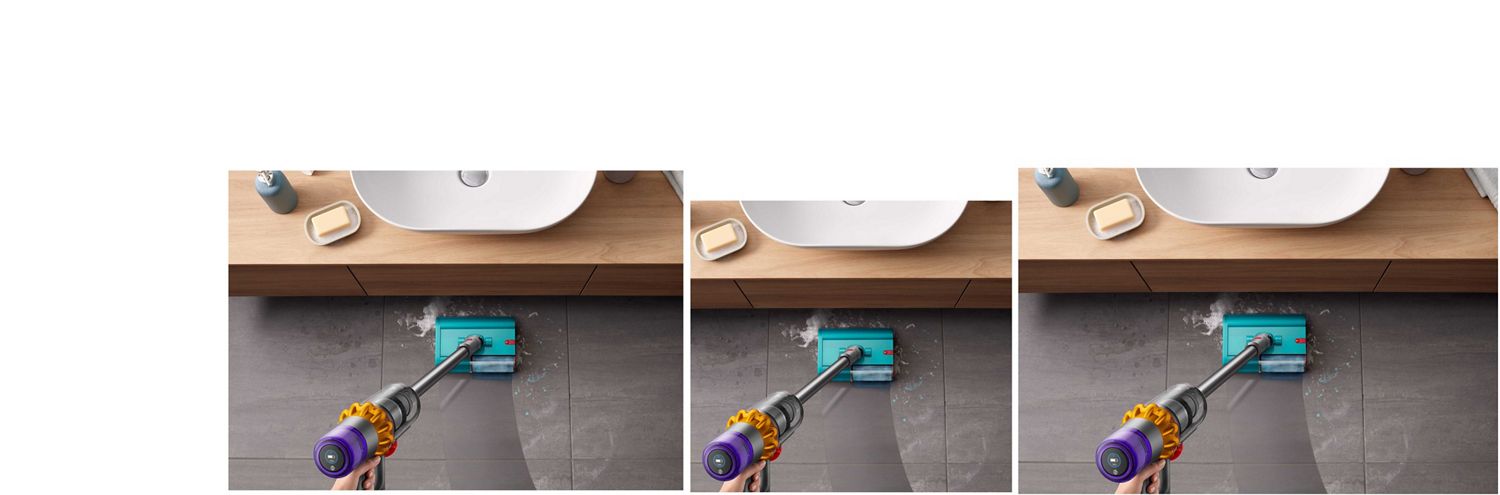 Dyson V15s Detect Submarine wet roller head cleaning a tiled bathroom floor from soapy water and toothpaste with a basin located to the front.