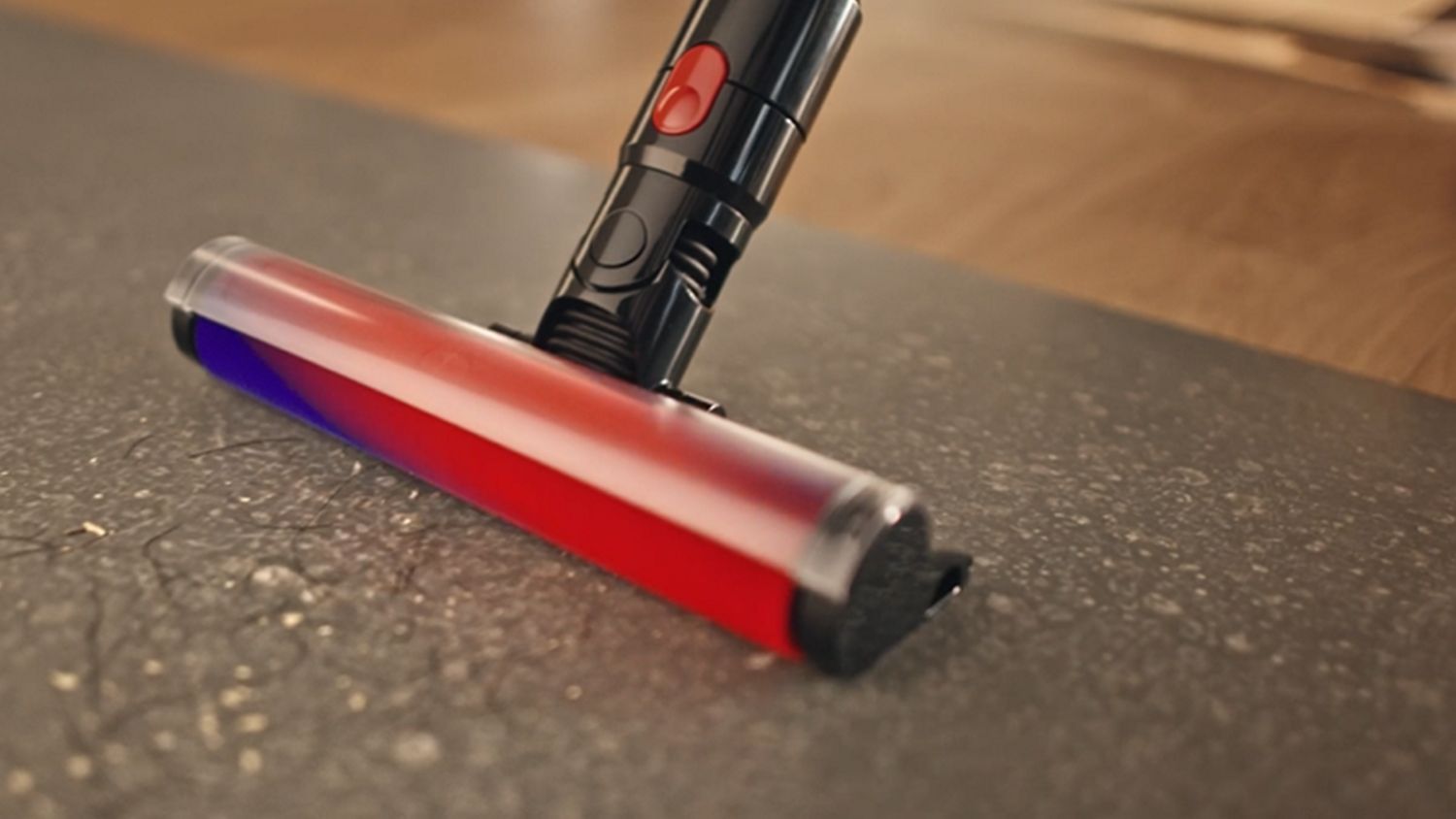 The Dyson V8 Cyclone cordless vacuum is used with the Fluffy cleaner head to clean around the home.