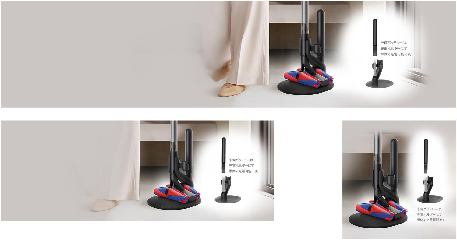A woman grabs her Dyson PencilVac cleaner from its charging dock.