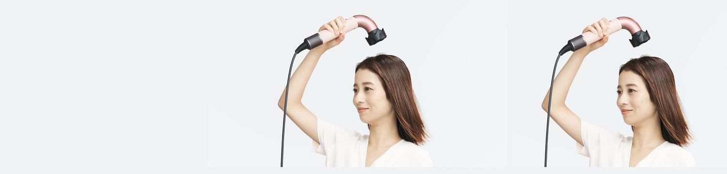 Dyson Supersonic rヘアドライヤーと低温ツールで髪を乾かすモデル