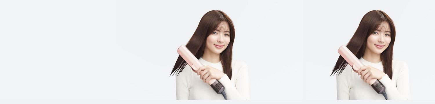 Dyson Airstraitストレイトナーを使用している女性モデル