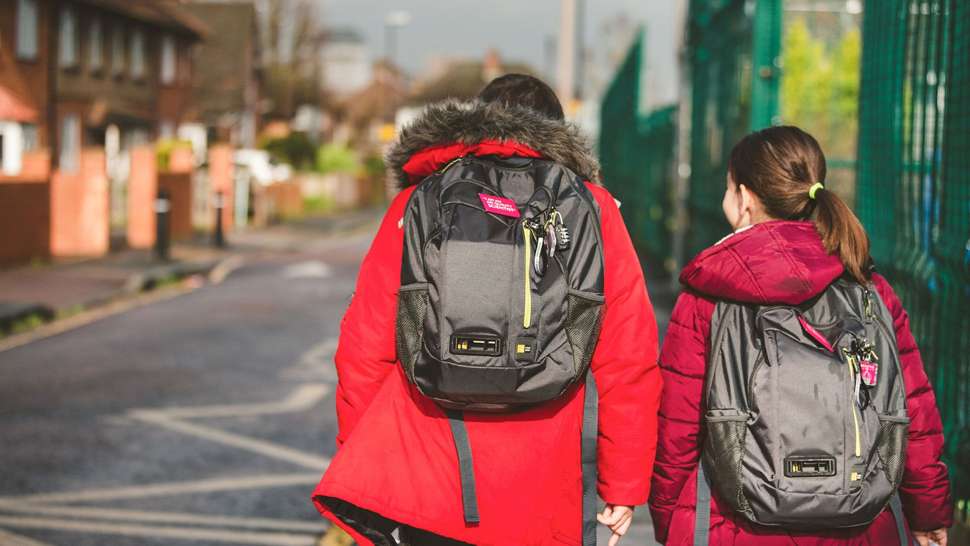 Children wearing Dyson air quality backpack